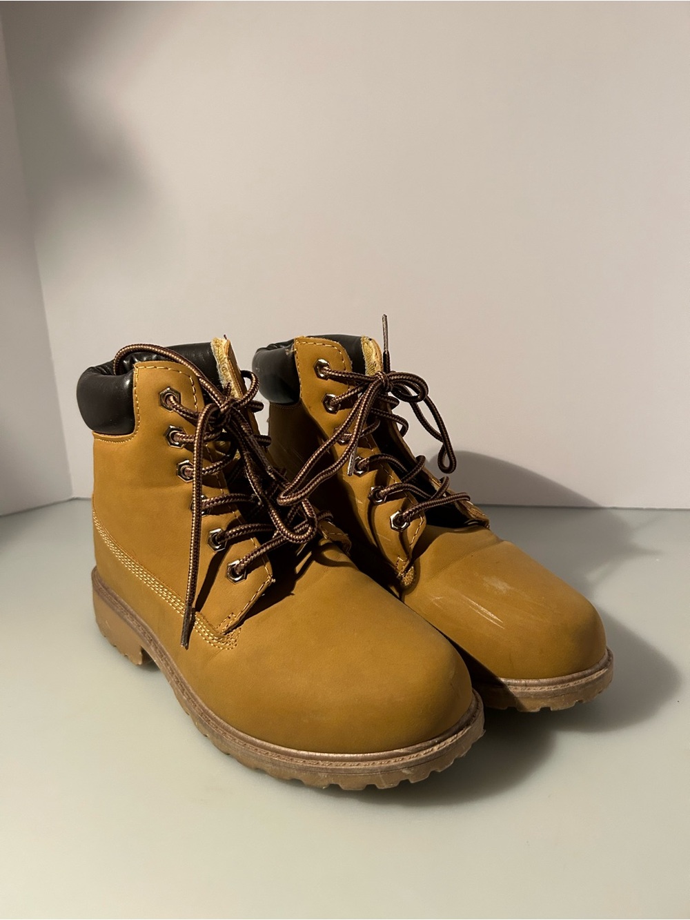 Fairly used tan boots size 5.5